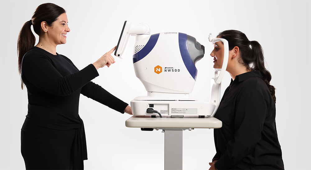 Topcon TRC-NW500 Non-Mydriatic Retinal Camera side view with technician and patient
